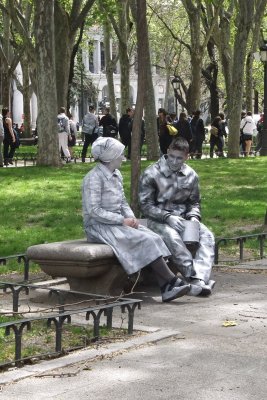 Silver statues take a break.