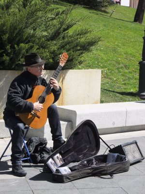 Edgar Moffatt.plays classical Spanish guitar outside the Prado