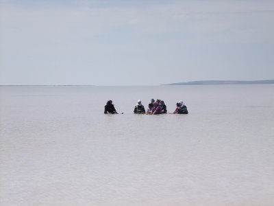 Local ladies 'bathing' on the salt lake