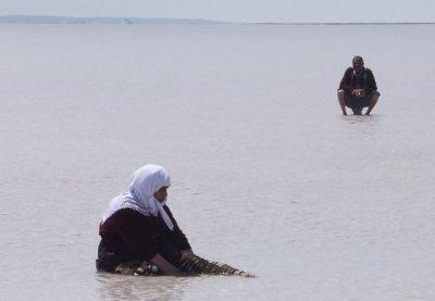 Locals soak in salt lake
