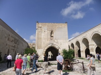 Central courtyard surrounded by stables for camels, Turkish baths, accomodation, market stalls.