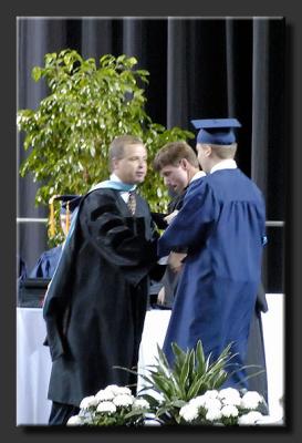 Receiving diploma