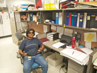 Jims at her desk.