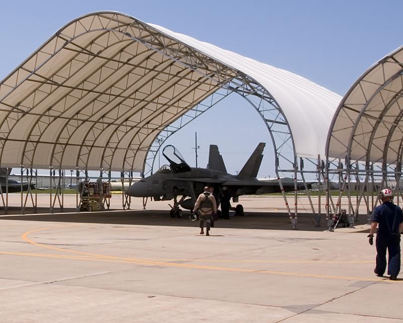 CMDR. McGrath makes his way out to his FA-18 Hornet