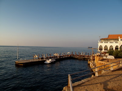 Cafe d'orient, Beirut, with tables placed near the water edge.