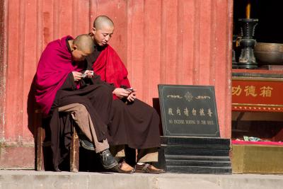 No Chinese monk would be caught without his cellphone!