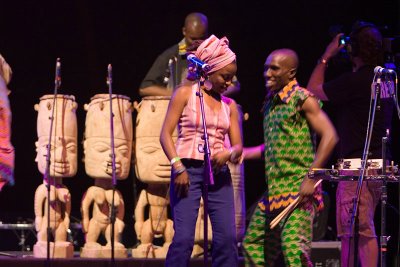 The singer and mysterious-other-percussion-instrument-player dancing together.  Check out the awesome drums in the back.