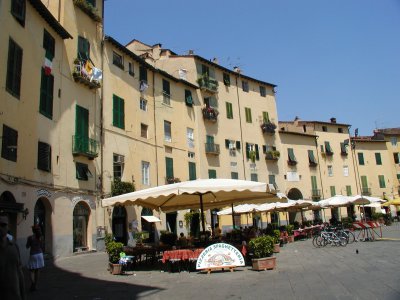 Lucca. The old Roman amphitheater is now a circlular piazza with apartments.