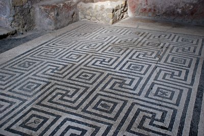 Mosiac tiled floor in the bath house