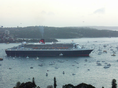 13 A terrific site the QM2 surrounded by many small boats