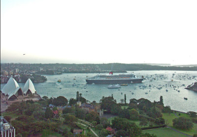 A terrific site the QM2 surrounded by many small boats