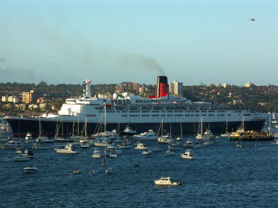 Queen Elizabeth II surrounded by small boats