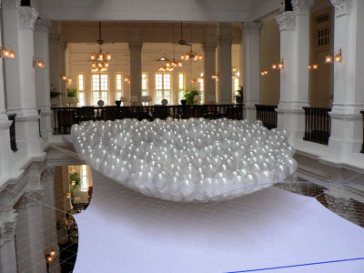 Balloons being suspended from the upper balcony