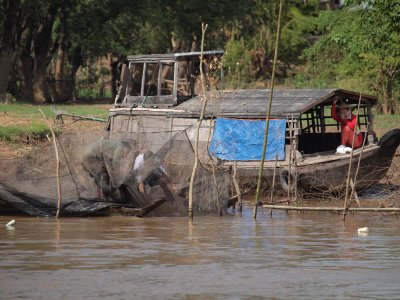 MEKONG RIVER FISHERMAN