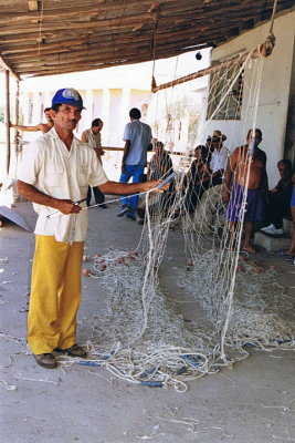 960224.10   Fisherman mending nets, Cabo Cruz, Cuba