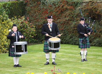 YOUNGER MEMBERS OF THE PIPER BAND