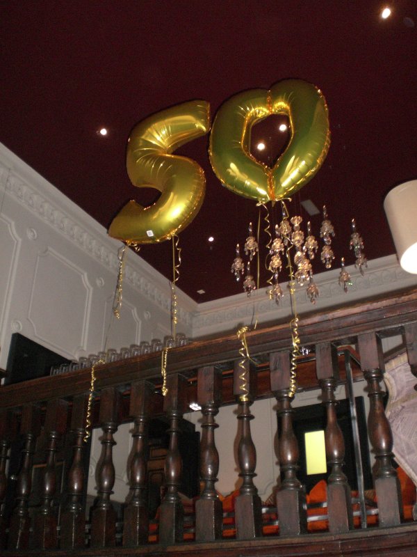 gold foil 50th on stairs.JPG