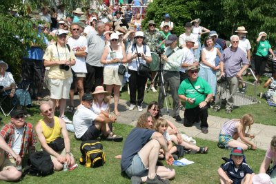 ... watched by an expectant crowd.