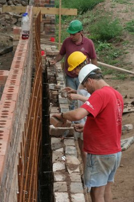 Any chipped bricks could be used on the back row of stretcher courses.