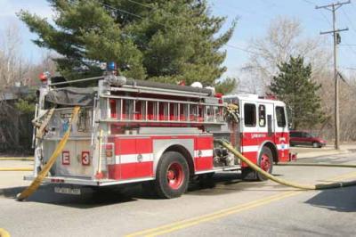Fitchburg,MA winds push brush fire into building 3-31-2006
