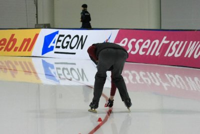 Butt on ice skates