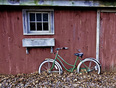 Bicycle Against Barn Wall