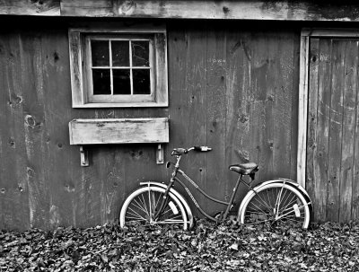 Bicycle Against Barn