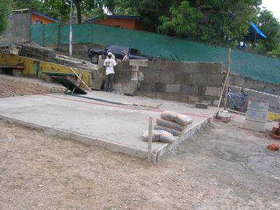 basketball court building the wall and leveling the concrete