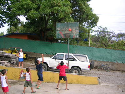 boys playing basketball in May 05