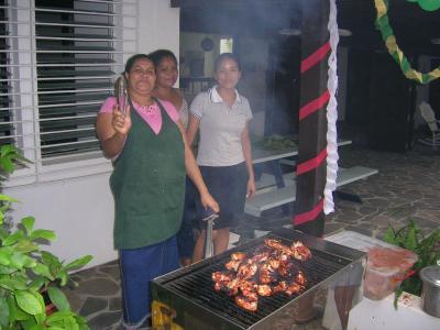 The ladies barbequeing