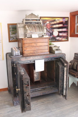 A cash register and safe in the museum