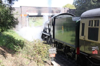 A steam train at Winchcombe Station