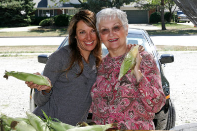 Linda Joan getting corn.jpg