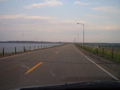 I'm still traveling the long dam road back home.