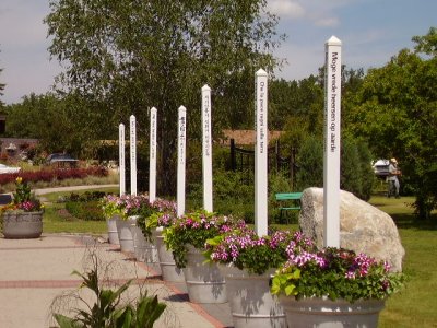 Some Peace Poles running across the border