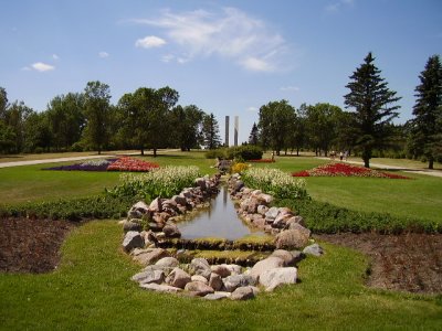 The previous two gardens alongside the watery border