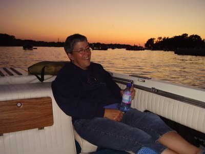 Joan relaxing with a brew... well, with a water... waiting for sundown