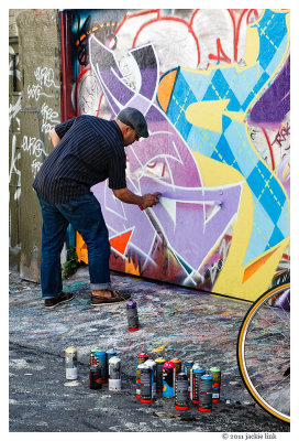 Clarion Alley artist at work.jpg