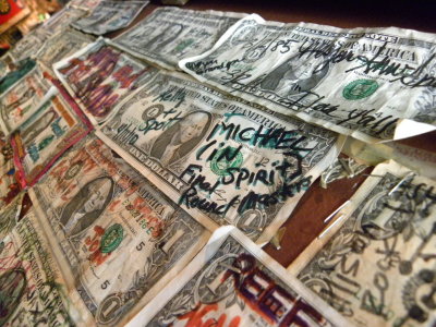 Thousands of Dollars on the wall at The Griffon