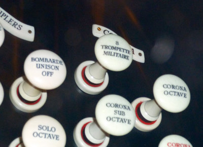 Some of the many stops on the organ