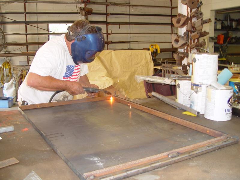 RANDY DUPREE STARTING TO BUILD THE FRAME WORK FOR THE NEW SWING OPEN DOOR