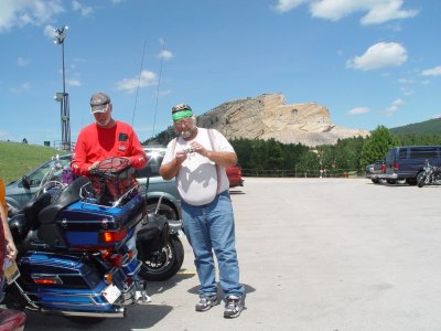 SANDY AND RICKY WITH CRAZY HORSE IN THE BACKGROUND
