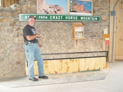 I PICK OUT A STONE FROM A RECENT BLASTING AT CRAZY HORSE