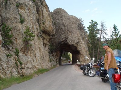 A SCENIC THROUGH THE MOUNTAIN PASSAGE ON A ROAD IN CUSTER STATE PARK