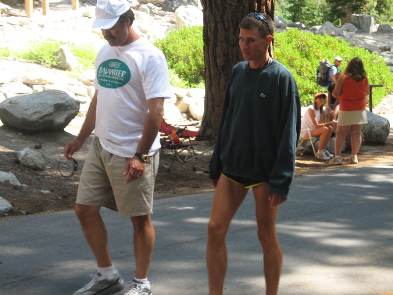 Akos Konya (from the 6 am start group) waits for Scott Jurek at the finish line