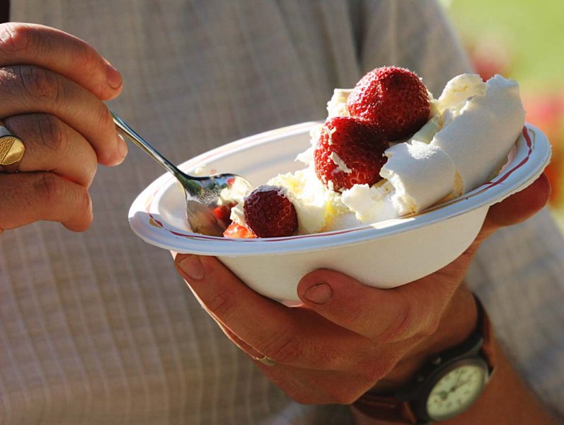 Teacher eats strawberries