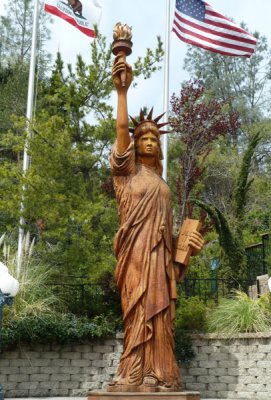 Log Carved into Statue of Liberty