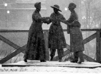women in a snow storm..
