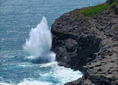 Waves hit the rocks near Lighthouse
