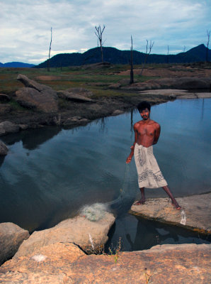 Vedda Man Net Fishing in Sri Lanka